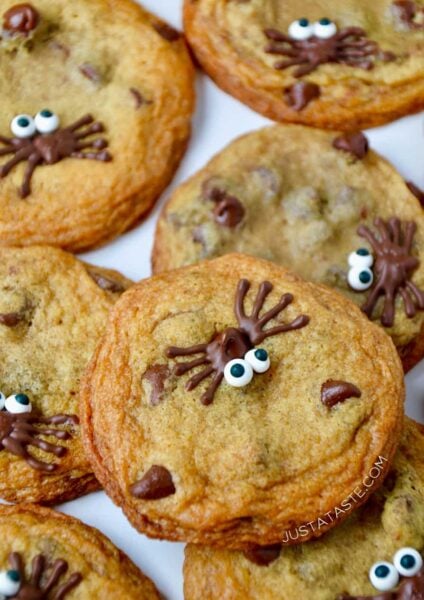 A close-up of Spider Chocolate Chip Cookies stacked on top of each other